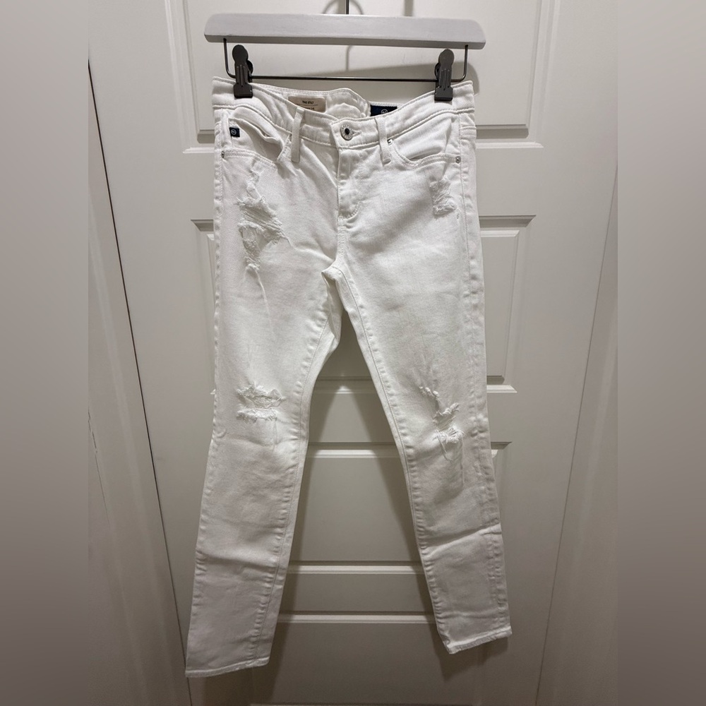 AG. The Stilt Cigarette Leg. Size 25R. Low Rise. Distressed. White.